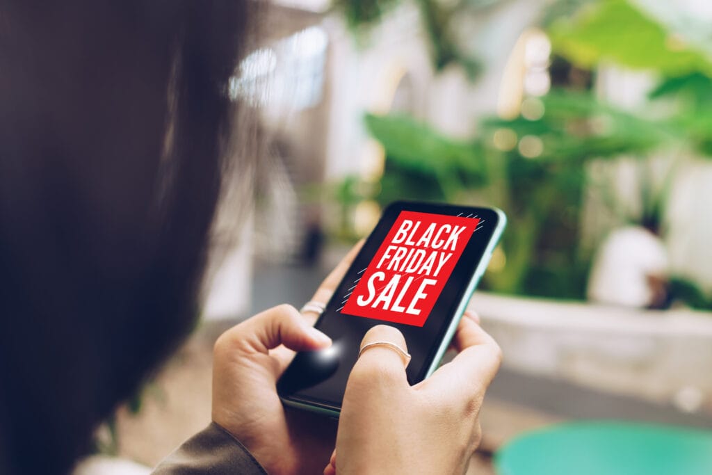 Women hand using smartphone do online selling on black friday sa Deals for Black Friday